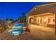 Backyard with a luxurious pool and spa, ideal for relaxing and entertaining outdoors at 5162 Estasi St, Las Vegas, NV 89135