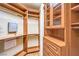 Spacious walk-in closet with custom built-in shelving and ample storage at 5162 Estasi St, Las Vegas, NV 89135