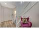 Bright entryway with a staircase featuring white railings, leading to the upper levels of the home at 5244 Fiery Sky Ridge St, Las Vegas, NV 89148