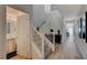 Open entryway featuring a staircase, modern flooring, and easy access to the living areas at 5244 Fiery Sky Ridge St, Las Vegas, NV 89148