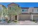 Charming two-story home featuring a well-maintained yard, a two-car garage and a classic stucco exterior at 5244 Fiery Sky Ridge St, Las Vegas, NV 89148