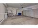 Spacious two car garage with plenty of room for cars, tools, and a water softener at 5244 Fiery Sky Ridge St, Las Vegas, NV 89148
