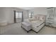 Main bedroom showcasing a plush bed, decorative pillows, and matching furniture set at 5244 Fiery Sky Ridge St, Las Vegas, NV 89148