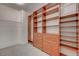 Spacious walk-in closet boasts custom shelving and storage solutions for ample organization at 5244 Fiery Sky Ridge St, Las Vegas, NV 89148