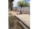 Spacious backyard featuring a basketball court and tiered landscaping at 5389 Spencer St, Las Vegas, NV 89119