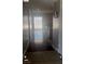 Hallway with hardwood floors leading to the living room and back patio at 5389 Spencer St, Las Vegas, NV 89119