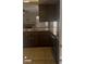 Kitchen with tile flooring and wooden cabinets at 5389 Spencer St, Las Vegas, NV 89119