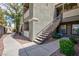 A view of the exterior of the unit, showcasing the staircase and walkway at 555 E Silverado Ranch Blvd # 2164, Las Vegas, NV 89183