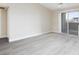 Bright, airy living room showcasing sleek floors and sliding glass doors to balcony at 555 E Silverado Ranch Blvd # 2164, Las Vegas, NV 89183