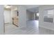 Open-concept living space featuring modern gray flooring and abundant natural light at 555 E Silverado Ranch Blvd # 2164, Las Vegas, NV 89183