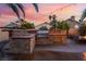 Outdoor kitchen and patio create a perfect backyard setup for entertaining and relaxation at 5779 Baffy Cir, Las Vegas, NV 89142