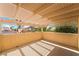 Covered outdoor balcony area provides ample sunlight with a pergola roof at 5779 Baffy Cir, Las Vegas, NV 89142