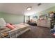 Bright bedroom features a large dresser, comfy seating, and ample storage at 5779 Baffy Cir, Las Vegas, NV 89142