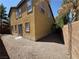 Exterior view of a backyard with gravel landscaping at 5861 Varese Dr, Las Vegas, NV 89141
