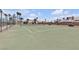 A bright and well-maintained outdoor tennis court presents an opportunity for active recreation and leisurely matches at 5990 Ablette Ave, Las Vegas, NV 89122