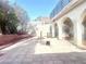 View of a spacious backyard featuring concrete pavers and landscaped perimeter at 6374 Horizon Ridge Ct, Las Vegas, NV 89156