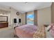 Primary bedroom with a window to outdoor living space at 6374 Horizon Ridge Ct, Las Vegas, NV 89156