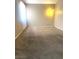 Empty carpeted room with natural light, ready for your personal touch at 6374 Horizon Ridge Ct, Las Vegas, NV 89156