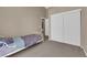 Bedroom with carpet, closet, and access to bathroom at 6374 Horizon Ridge Ct, Las Vegas, NV 89156