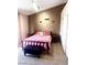 Spacious bedroom with carpet, featuring a vaulted ceiling and warm, neutral tones at 6374 Horizon Ridge Ct, Las Vegas, NV 89156
