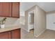 Hallway featuring bathroom, wood flooring, and cabinet at 6374 Horizon Ridge Ct, Las Vegas, NV 89156