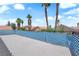 Rooftop featuring palm trees and neighborhood views under a sunny sky at 6374 Horizon Ridge Ct, Las Vegas, NV 89156