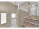 Interior staircase with railing, carpeted steps, and natural light at 6374 Horizon Ridge Ct, Las Vegas, NV 89156