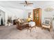Comfortable living room with couch, wood furniture, and decor at 6630 Bubbling Brook Dr # C, Las Vegas, NV 89107