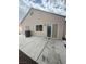 Backyard with a concrete patio and sliding glass door entry at 6642 Cinnabar Coast Ln, North Las Vegas, NV 89084