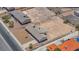 Aerial view of home with desert landscaping on a sunny day from above at 6727 E Washington Ave, Las Vegas, NV 89110