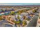 Aerial view of a home with a large backyard, landscaping, and a private pool at 6971 Cedar Basin Ave, Las Vegas, NV 89142