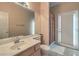 Bathroom featuring a single sink vanity and a shower with a curtain at 6971 Cedar Basin Ave, Las Vegas, NV 89142