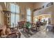 Spacious living room boasts high ceilings and elegant decor at 6971 Cedar Basin Ave, Las Vegas, NV 89142