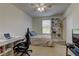 Comfortable bedroom features a bed, desk, shelves, and ceiling fan for relaxation at 7104 Flathead River Ave, Las Vegas, NV 89179