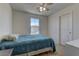Comfortable bedroom featuring a window and carpeted floors at 7104 Flathead River Ave, Las Vegas, NV 89179