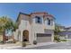 Charming two-story home featuring desert landscaping, and an attached two-car garage at 7104 Flathead River Ave, Las Vegas, NV 89179