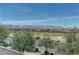 Mountain views from a second story window showcasing the surrounding landscape at 7104 Flathead River Ave, Las Vegas, NV 89179