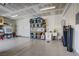 Spacious garage with epoxy flooring and shelving at 7255 Bold Rock Ave, Las Vegas, NV 89113