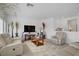 Airy living room with neutral tones, comfortable seating, and stylish decor at 7255 Bold Rock Ave, Las Vegas, NV 89113