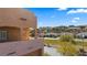Balcony view of desert landscaping and community homes in a tranquil setting, offering a peaceful retreat at 728 Hardy Way # E, Mesquite, NV 89027