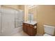 Cozy bathroom with shower-tub combo, vanity, and toilet, offering a practical space with clean lines and a classic design at 728 Hardy Way # E, Mesquite, NV 89027
