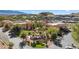 Scenic view of the community featuring a waterfall, mature landscaping, and building exteriors at 728 Hardy Way # E, Mesquite, NV 89027