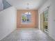 Open dining area with slider door access to outdoor patio at 7753 Petite Pillar Ct, Las Vegas, NV 89149