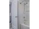 Shower-tub combo features tile surround and convenient shower head at 7753 Petite Pillar Ct, Las Vegas, NV 89149
