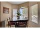 Cozy breakfast nook bathed in natural light from multiple windows at 805 Palmero Way, Boulder City, NV 89005