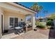 Covered patio features a built-in grill and seating area at 805 Palmero Way, Boulder City, NV 89005