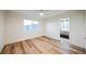 Bright bedroom with wood-look flooring and a view of the outdoors at 831 E Valiant Ave, Pahrump, NV 89060
