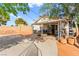 Spacious backyard featuring a covered patio and ample room for activities at 8505 Lansdale Rd, Las Vegas, NV 89123
