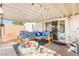 Covered patio with comfortable seating and a fun, playful atmosphere at 8505 Lansdale Rd, Las Vegas, NV 89123