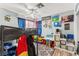 A bedroom with a modern ceiling fan, bunk bed, and game room decor at 8505 Lansdale Rd, Las Vegas, NV 89123